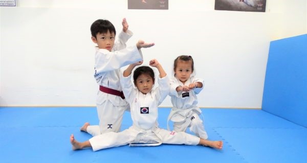 Children in Taekwando positions at ACME Sabertooth