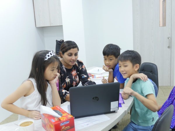 Teacher with students in Words Worth