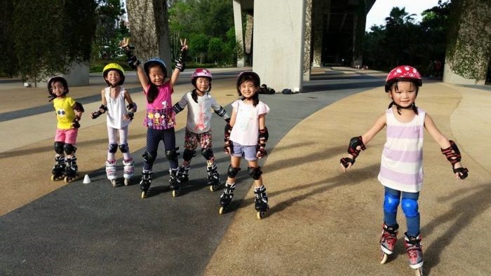 Children learning how to inline skate with iSkate